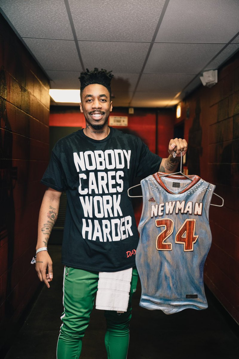 This is hands down one of the greatest gifts I’ve ever received. I’m in ABSOLUTE SHOCK. A supporter HAND crafted my college basketball jersey out of wood and colored it perfectly. It was waiting for me at the show in Atlanta, Georgia backstage before I got on the other night. If