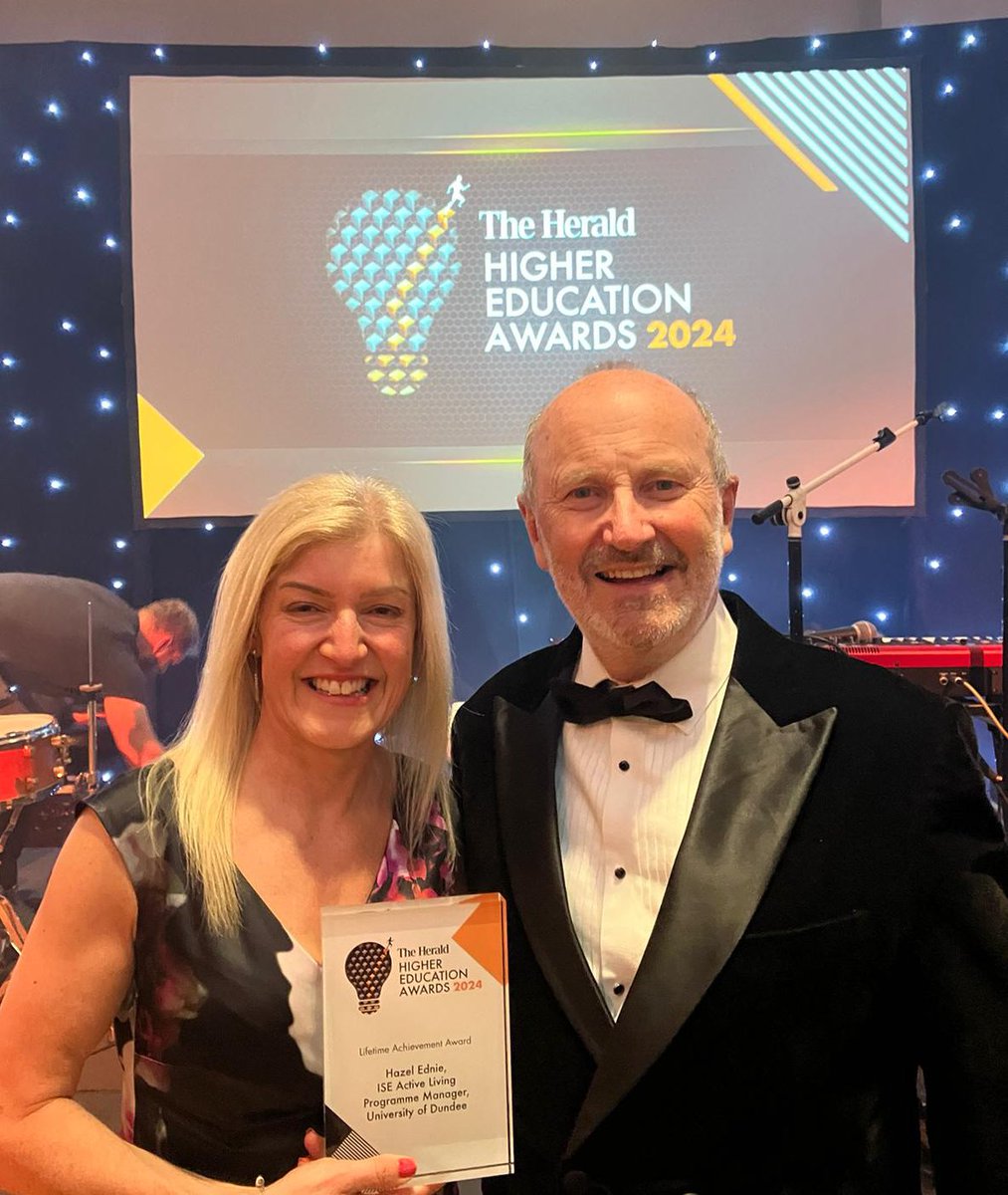University of Dundee (@dundeeuni) on Twitter photo <a href="/ColinEMurdoch/">Dr Colin Murdoch</a> <a href="/JillBelch/">Dr Jill Belch</a> And now Hazel Ednie has been named the winner of the Lifetime Achievement Award!
Hazel has been delivering @isedundee’s Active Living Programme for 29 years. The programme runs over 1,100 classes with an annual attendance of around 17,000, and supports exercise and wellbeing. <a href="/ColinEMurdoch/">Dr Colin Murdoch</a> <a href="/JillBelch/">Dr Jill Belch</a> And now Hazel Ednie has been named the winner of the Lifetime Achievement Award!
Hazel has been delivering @isedundee’s Active Living Programme for 29 years. The programme runs over 1,100 classes with an annual attendance of around 17,000, and supports exercise and wellbeing.
