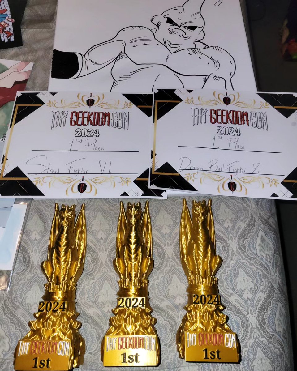 Been awhile since i posted but just got back from a convention and took home 3 first place trophies playing DBFZ, MK1, and SF6. Got 4th in tekken 8 and around 8th place in GGST. Incredibly proud of my progress and only wanna get better from here 😁