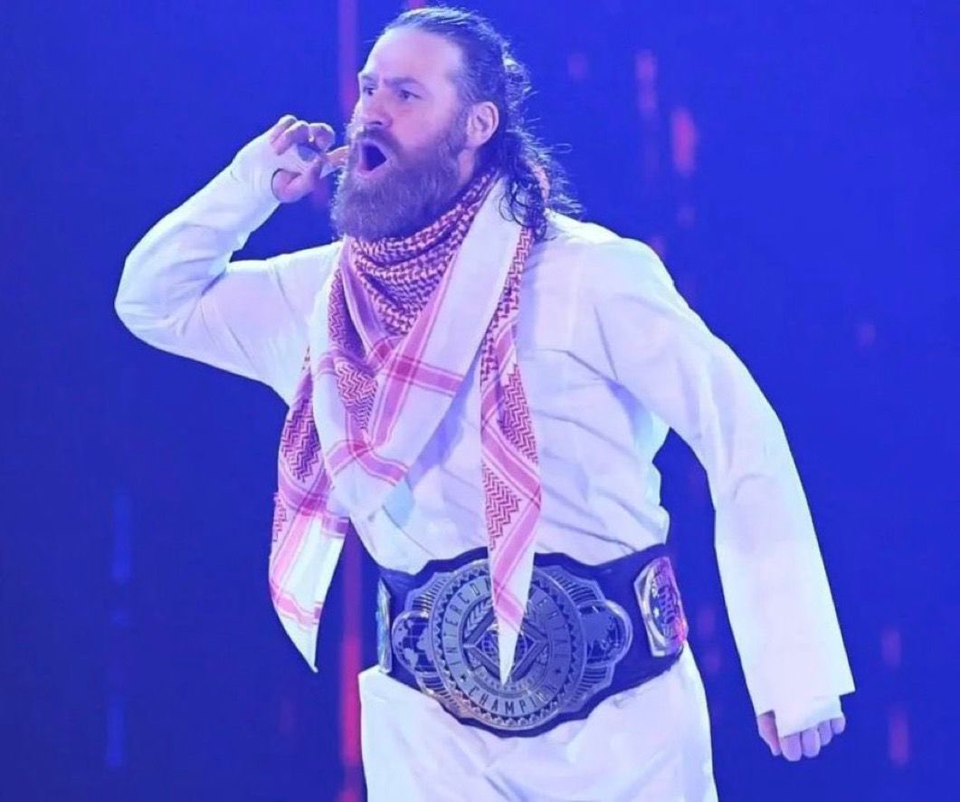 WWE WRESTLER SAMI ZAYN CAME OUT WEARING A KEFFIYEH