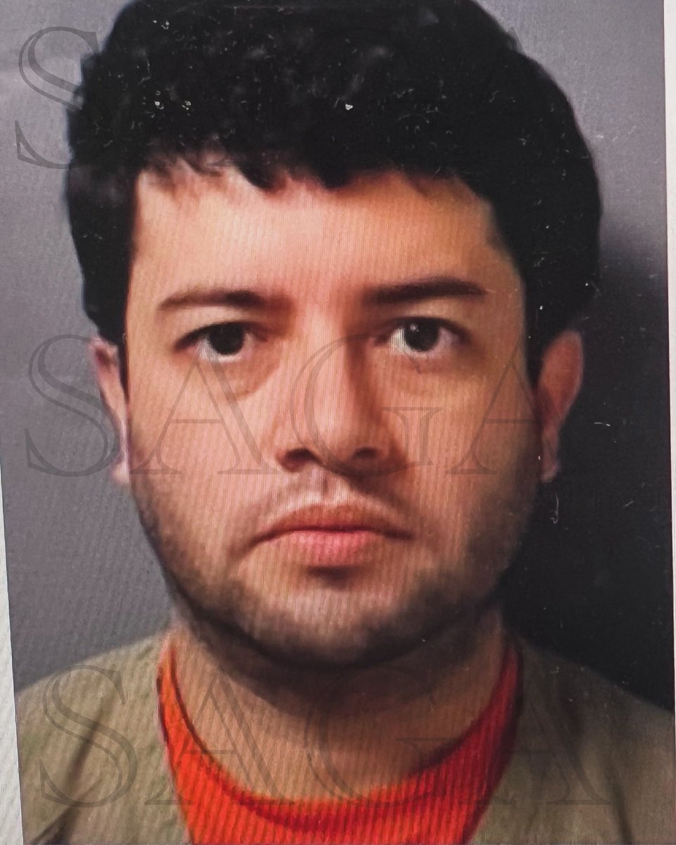 EXCLUSIVE: El Nini’s mugshot at MDC Brooklyn. Nestor Isidro Pérez was processed on Tuesday morning as he exited his initial court appearing. He quietly listened to over 10 charges against him that could land him anywhere from 10 years to life in prison.