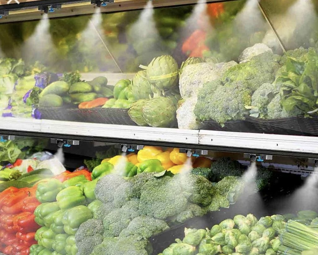 holy sh*t... the mist sprayed on produce at grocery stores isn't water... it's full of chlorine to disinfect the produce