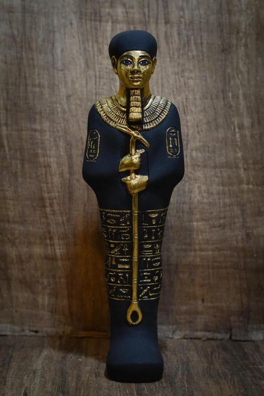 statue of Ptah god of Memphis and craftsmen painted black gold leaf heavy stone, Ancient Egypt Pharaoh.