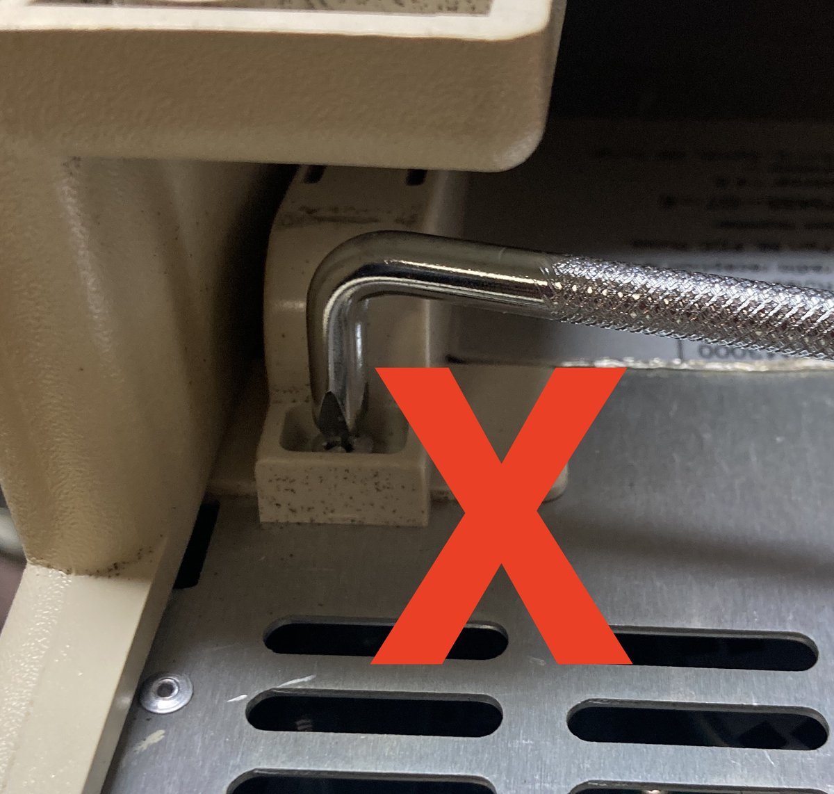 FYI, if you are taking apart a Dynalogic Hyperion, there are only six screws to worry about: two flathead captive in the handle, two Phillips on the bottom, and these sneaky Phils on the bottom-side. Don't bother trying to remove the hard-to-reach ones. #retrocomputing