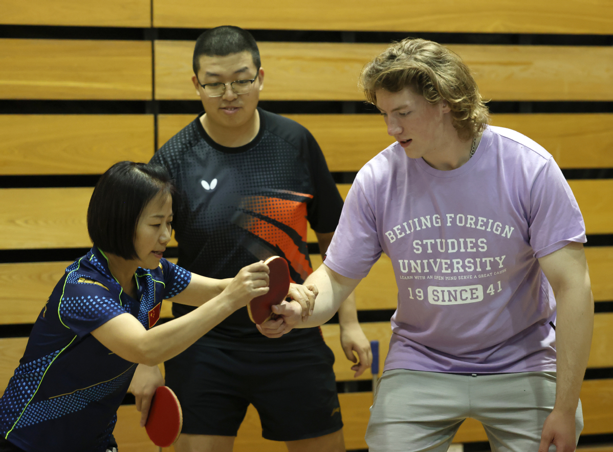 Beijing Foreign Studies University (#BFSU) welcomed 🥳 a group of American students from Indiana University of Pennsylvania (#IUP) on May 20! They played table tennis🏓 with BFSU students and also practiced Tai Chi. Check out the photos to see how much fun they had.🥰