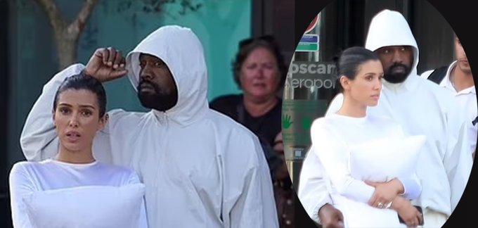 Bianca Censori, wife of Kanye West, confidently rocks a thong bodysuit while covering up with a pillow as the couple returns to Italy.