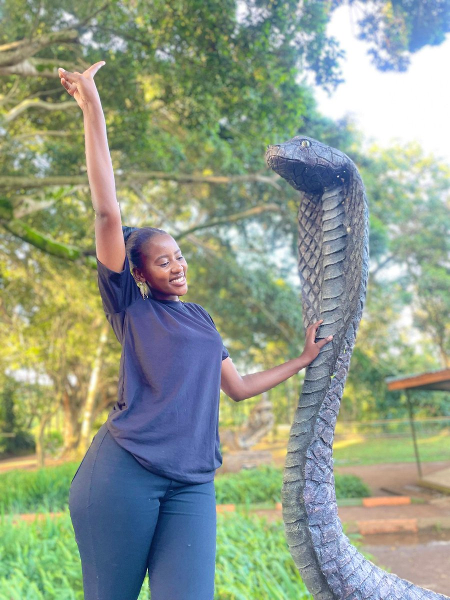 The most dangerous animal on earth standing happily near a snake 😂💀