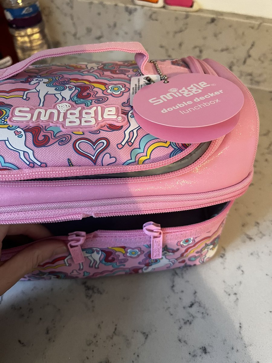 JemmaGaunt's tweet photo. @smiggle_ had this bought for Xmas from a grandparent first time using it yesterday (child only year 2) she’s devastated as she only used it half a day the zip has broken, and looking at it compared to another there’s a bit missing  #help #smiggle #upset6yearold https://t.co/TbTZGZD3Ah