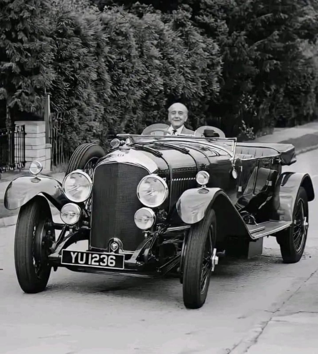 Legendary English engineer Walter Owen Bentley in his 1927 Bentley 4½ Litre……