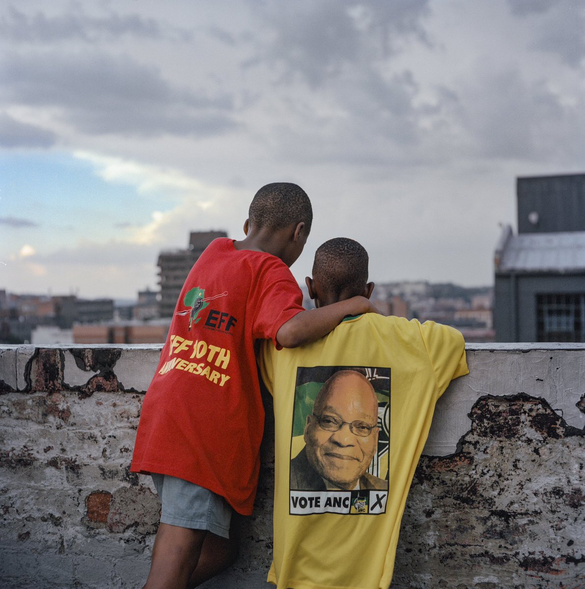 Voting day. 🗳️

Boys in inherited garments and convictions. Their shirts hang heavy, both with fabric and the complexities of the current state of affairs.