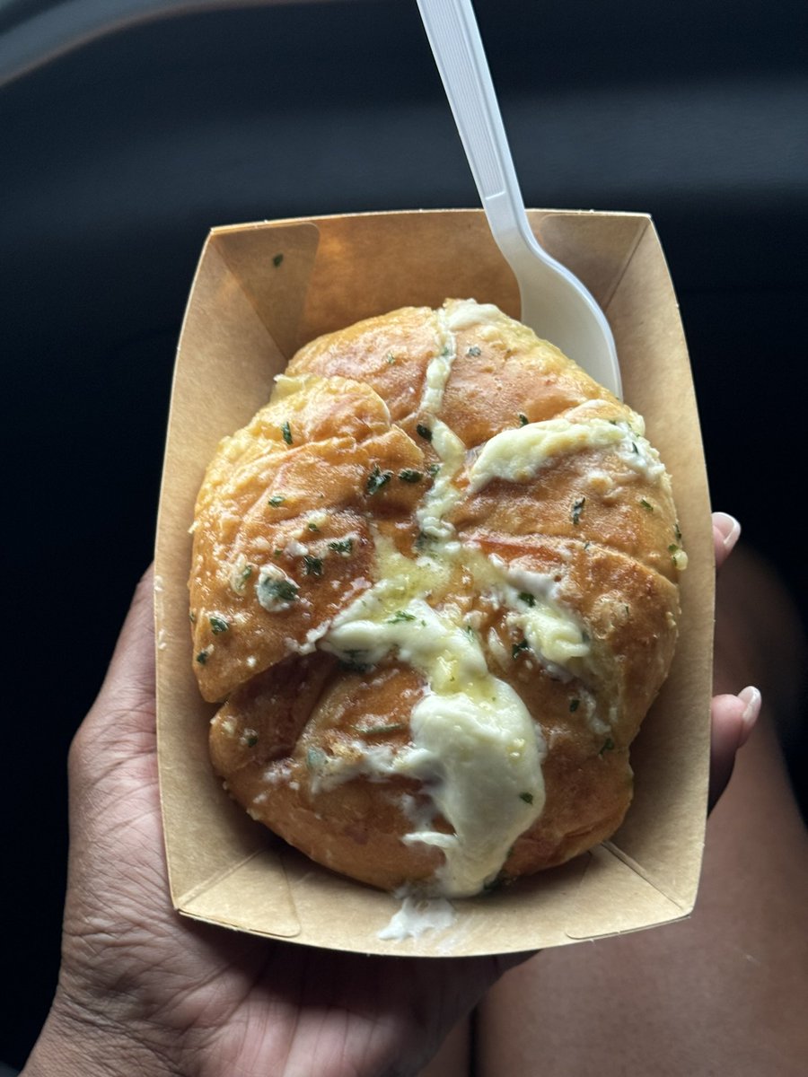 Garlic cheese bun from the Jacksonville Monthly Asian Market! 🧄🧀  #AsianEats #JacksonvilleMarket #FoodieFinds