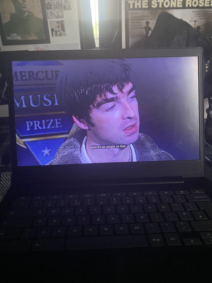noel gallagher on the laptop