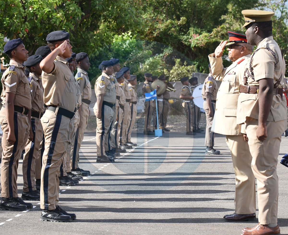 Brigadier Errol Johnson (second right), commandant of the Jamaica Combined Cadet Force, and Second Lieutenant Orane Shaw (right) inspect members of the St George’s College Cadet Unit during a naming ceremony at St George’s College in Kingston on Tuesday.

📸: Ian Allen