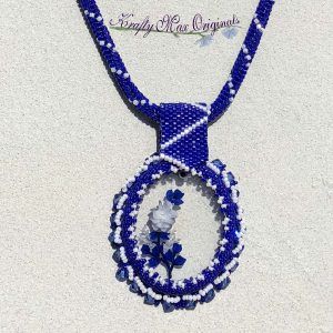 Flowers!
Blue and White Roses – Flowers Beadwoven Wearable Art Necklace with Center from Wildlife Plastics 
kraftymax.net/shop/blue-whit…