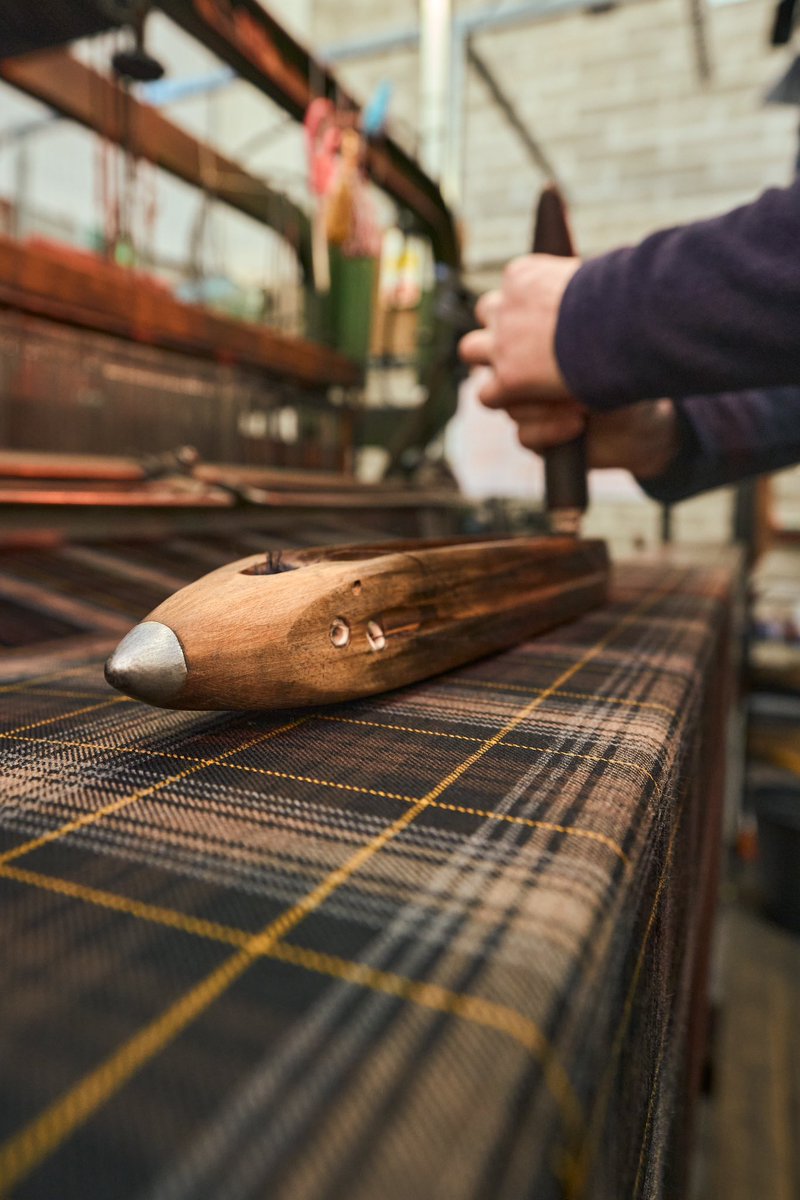 Fendi's tweet photo. The #FendiHandInHand project once more goes beyond Italy to pursue the finest craftsmanship from around the world, this time visiting the Scottish Highlands to celebrate the country's rich textile heritage.
There, Clare Campbell's Prickly Thistle – Cloth of Identity elevates the concept of tartans by weaving words, numbers, and symbols into their fabrics. For her interpretation of the #FendiBaguette, Clare worked with Fendi's traditional colourway and signature yellow, as well as the numbers five, for the five Fendi sisters, 1925, the year Fendi was founded, 1997, marking the creation of the Baguette, and 2008, the debut of the Peekaboo.
The resulting tartan is now registered within the Scottish Register of Tartans.