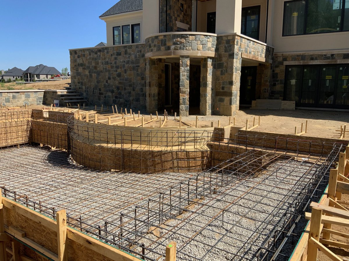 This custom home is ready for summer with its beautifully designed pool. Soon we will be pouring cement and this backyard will become the perfect oasis for warm, sunny #PureMichigan days. 

#HomeBuilder #Architecture #CustomHome #MichiganMade #BuildToSuit #DesignBuild #JPCraig