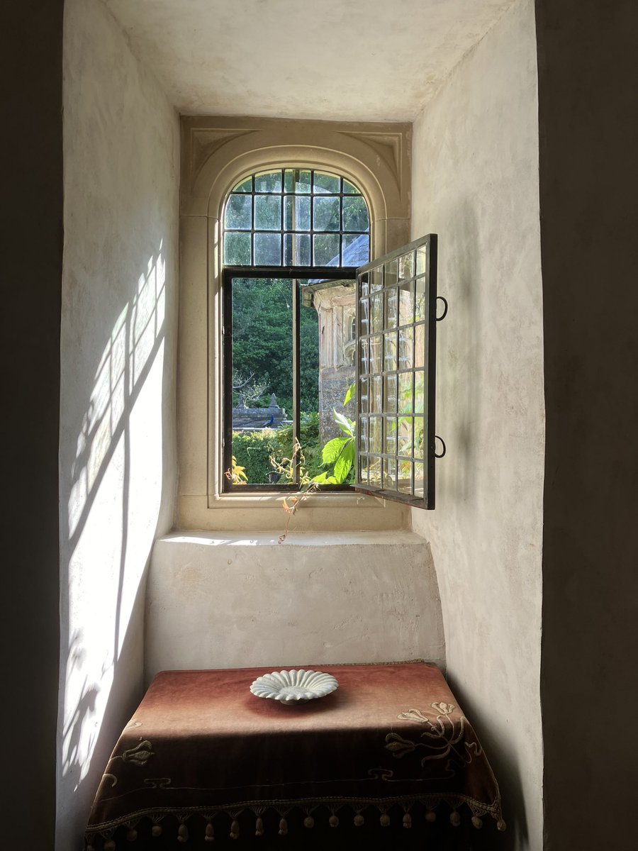 This is how an old house speaks: slowly, in coloured shadows on a wall, the fidget of a blackbird in the creeper, a bee drunk on the rosy breath of a humid afternoon.