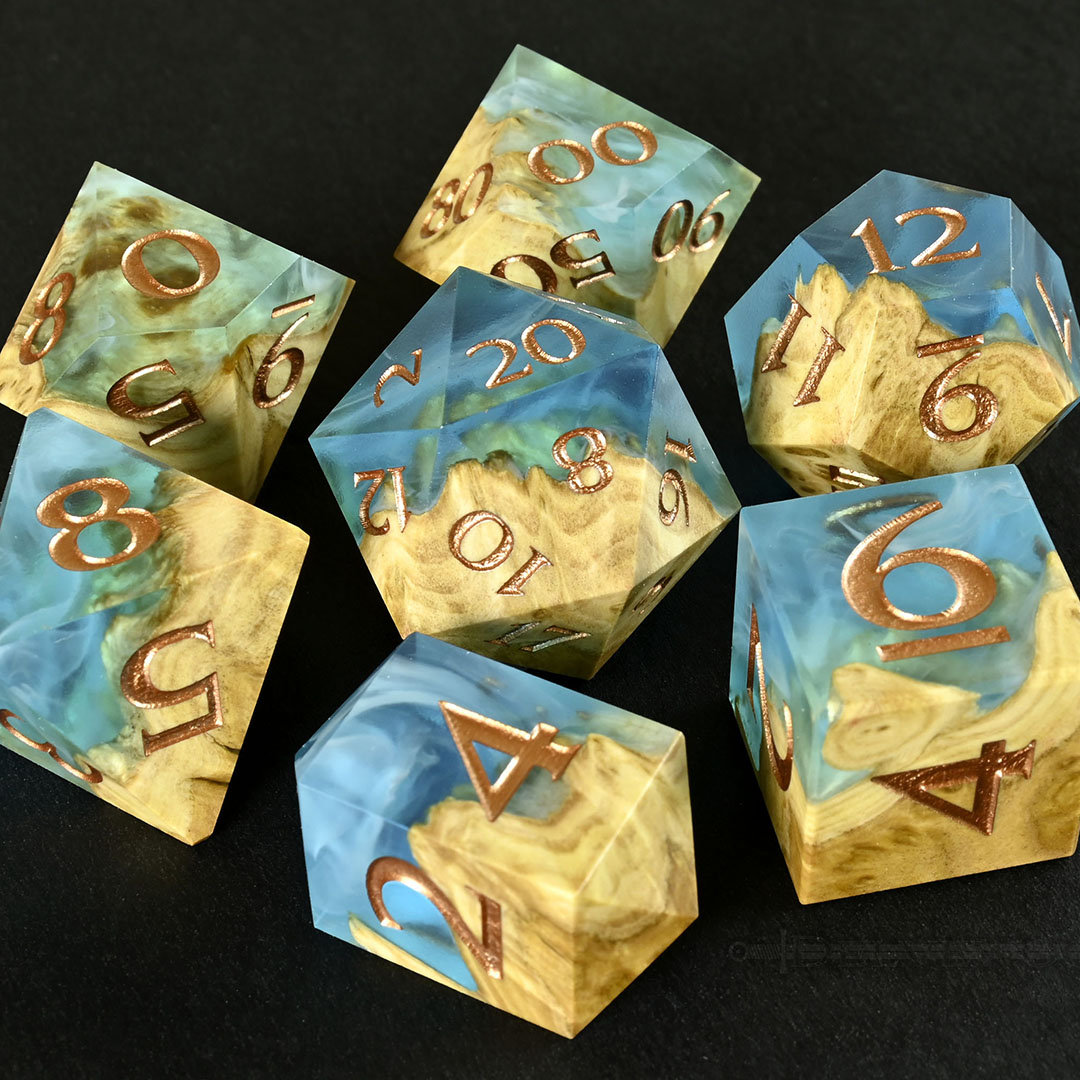 Shoreline - Brown Mallee burl wood and resin hybrid dice set.
#dice #dnd #handmadedice