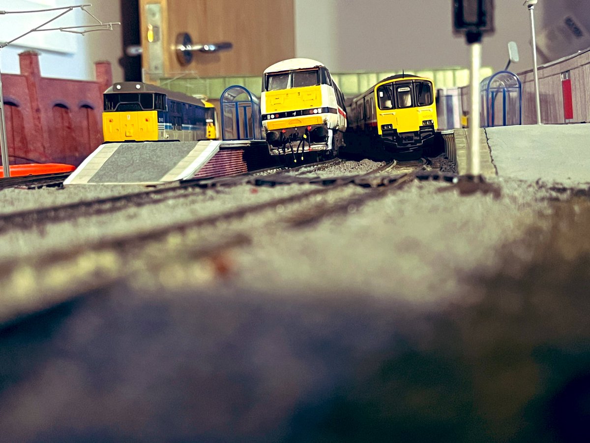 ModellingTom's tweet image. Station extension coming on nicely. Thinking up some ideas for relief scenery above the bridge now ….. #TMRGUK