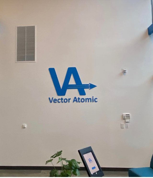 Dive into the quantum revolution with Vector Atomic! 🚀✨ We've teamed up to infuse their space with vibrant interior designs featuring their logo. Get ready to be inspired! #VectorAtomic #InteriorDesign #QuantumTech #InsigniaDesigns