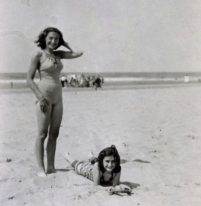 Anne Frank photographed with her sister Margot at the beach in Zandvoort, Netherlands, in 1940.       

Margot was the elder sister of Anne, and according to Anne’s diary, she also had kept a diary of her own, but no trace of it has ever been found.     

She died in the