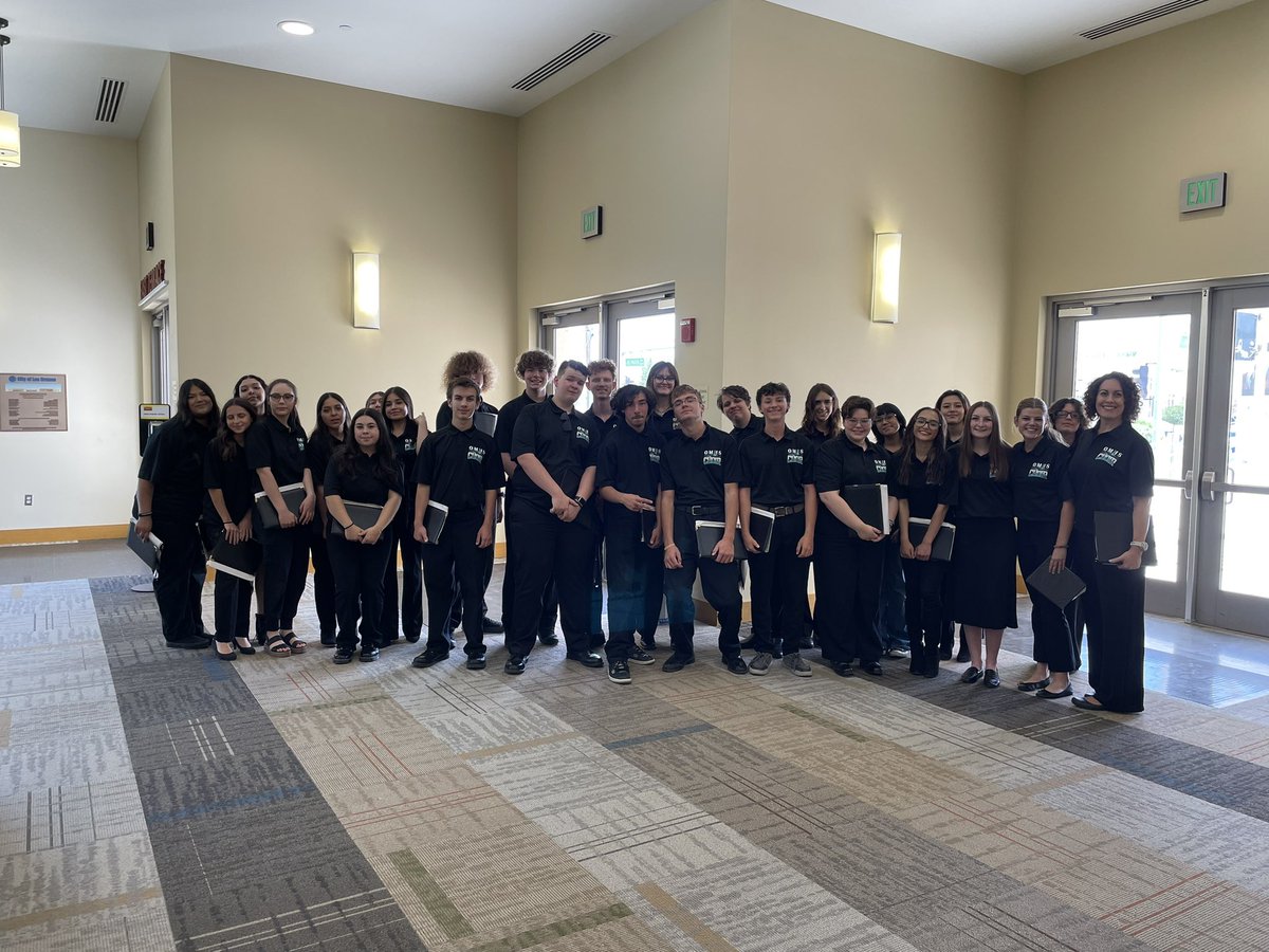 The varsity choir is getting ready to sing at the LCPS State of the District address. Go Knights!