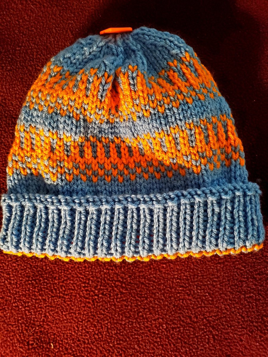 Finished! My first stranded colorwork piece. I designed it as well as knitted it.