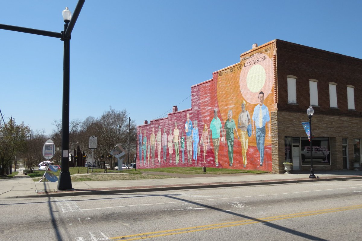 This mural in downtown Lancaster is a beautiful, artistic depiction of community & collaboration! AmeriCorps members in the @furmancac are proud to serve Lancaster County students and have a close connection to the mural. Their steward, @arrasfoundation, is right down the road!