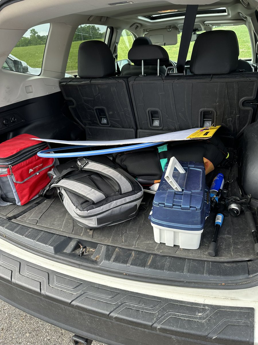 My trunk is a whole last month of the school year vibe: lab materials, fishing gear, and a hula hoop.