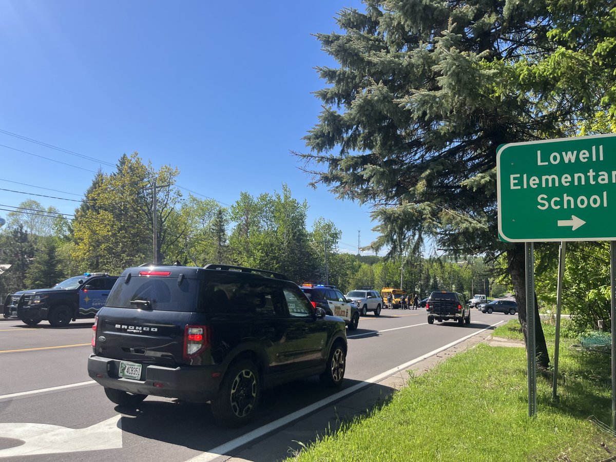 At the scene of a crash involving a school bus that has closed down a section of Rice Lake road near Lowell Elementary. Stay with @NorthernNewsNow for updates.