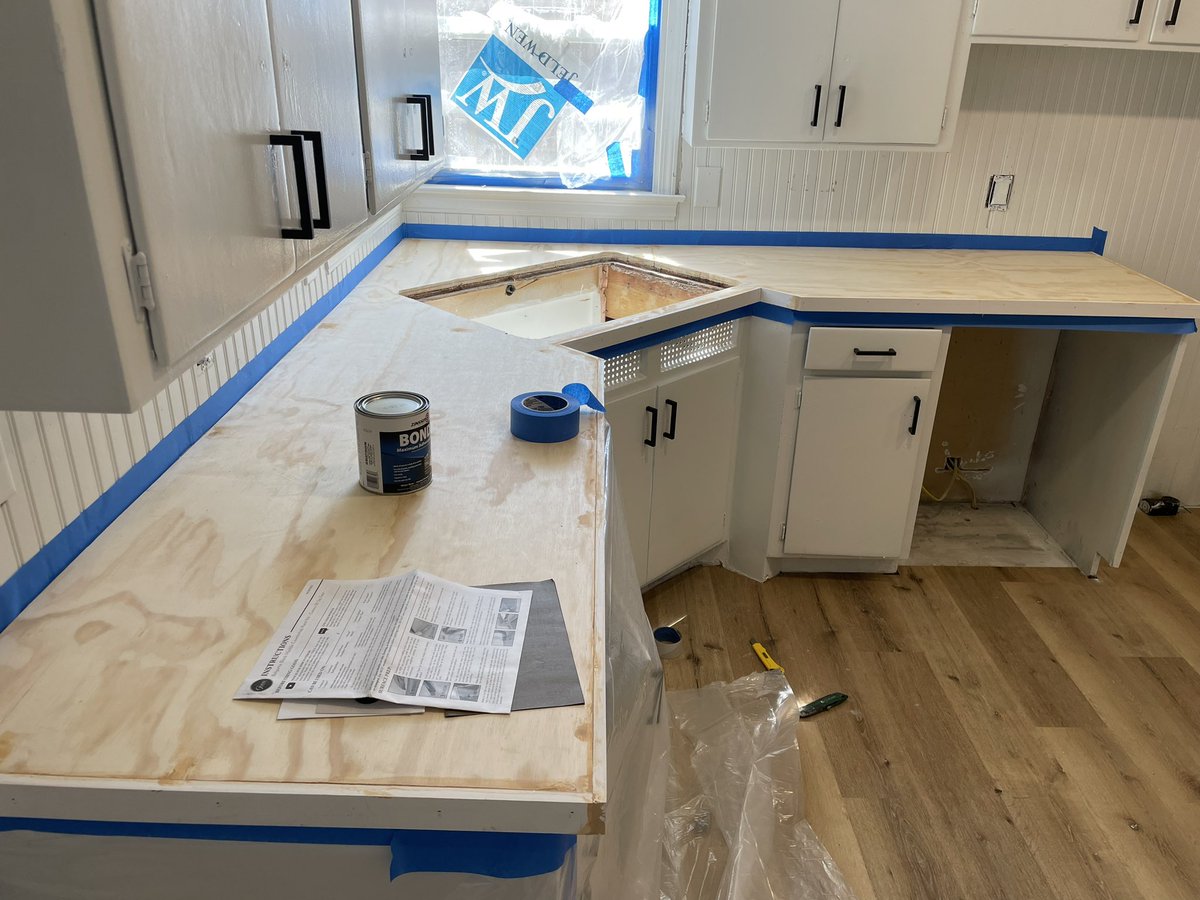 DIY epoxied plywood countertops. All in for ~$300. 

If these hold up, will probably do this exclusively in remodels from now on. Incredibly easy and inexpensive