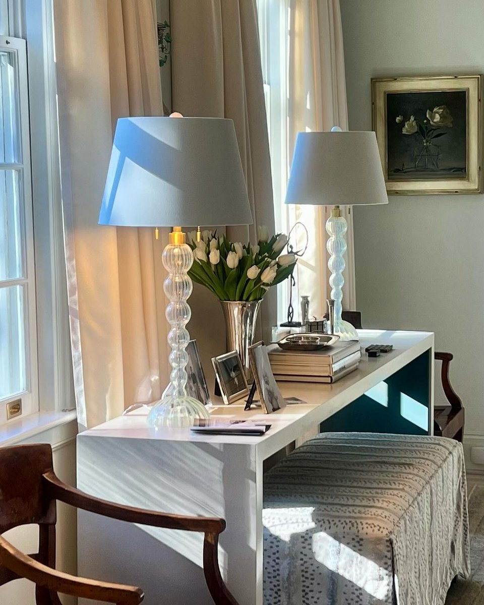 The Bollicina Lamps shine in @terithomasinteriors’ airy design.

These hand-blown Venetian glass lamps are called Bollicina for the "little bubbles" floating within.