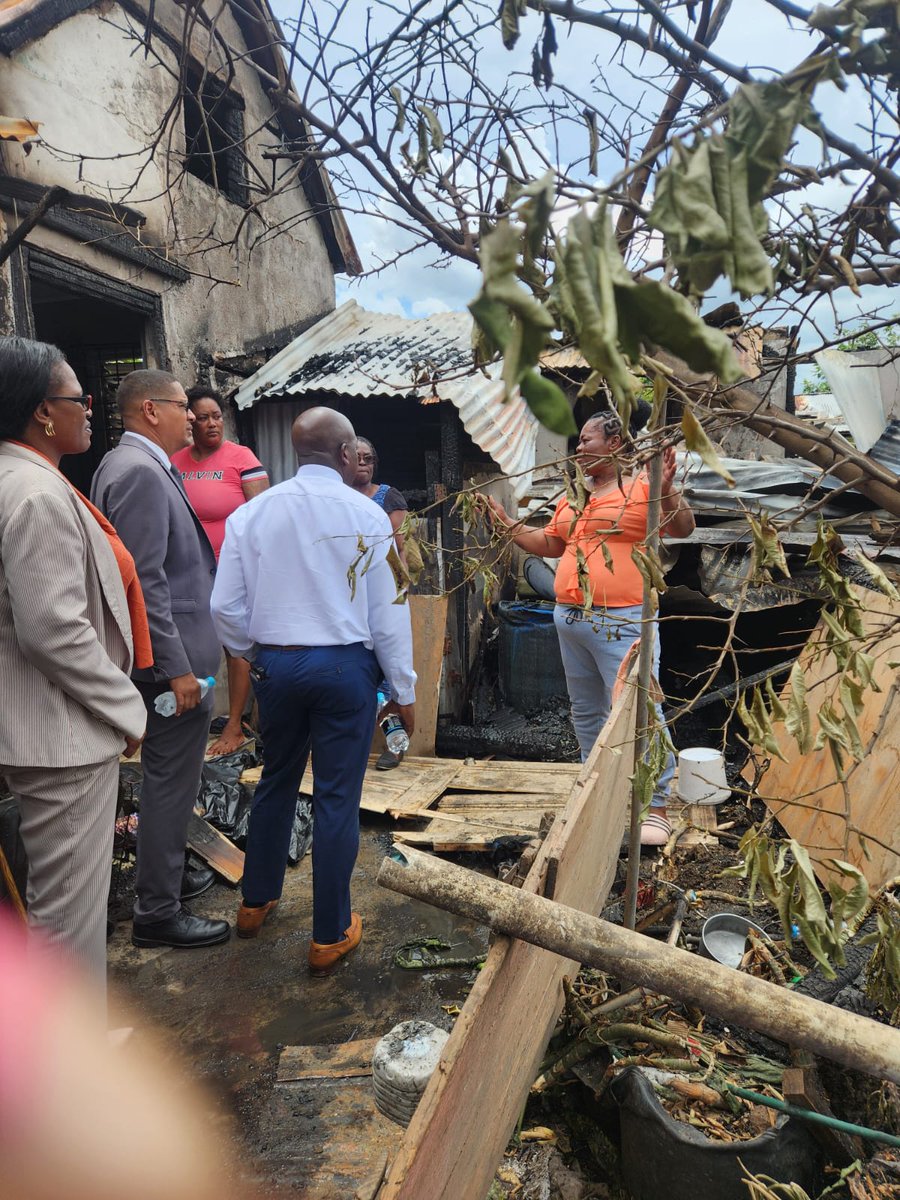 DWilliams_Ja's tweet photo. Delighted to welcome the Honorable Minister of Labor and Social Security, @pcharlesjr and his team to #CentralKingston. Minister Charles joined me in visiting the fire victims at Rosemary and Maiden Lane in Parade Gardens, providing relief supplies and support. https://t.co/FSTHGVWSPJ