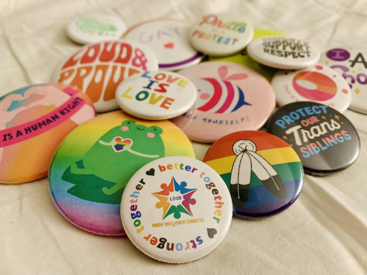 The 2SLGBTQIA+ focus group has button-making skills! Thank you to Trustees @garrettelliott and @bobbygodkin for coming, to @LimestoneDSB staff for supporting and to @KFPL for letting us use the button maker. Better together, stronger together. 🏳️‍🌈🏳️‍⚧️