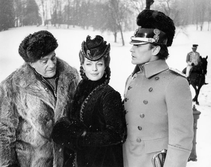 L to R: Director Luchino Visconti, Romy Schneider (23 September 1938 – 29 May 1982) and Helmut Berger on the set of the film 'Ludwig', 1973.