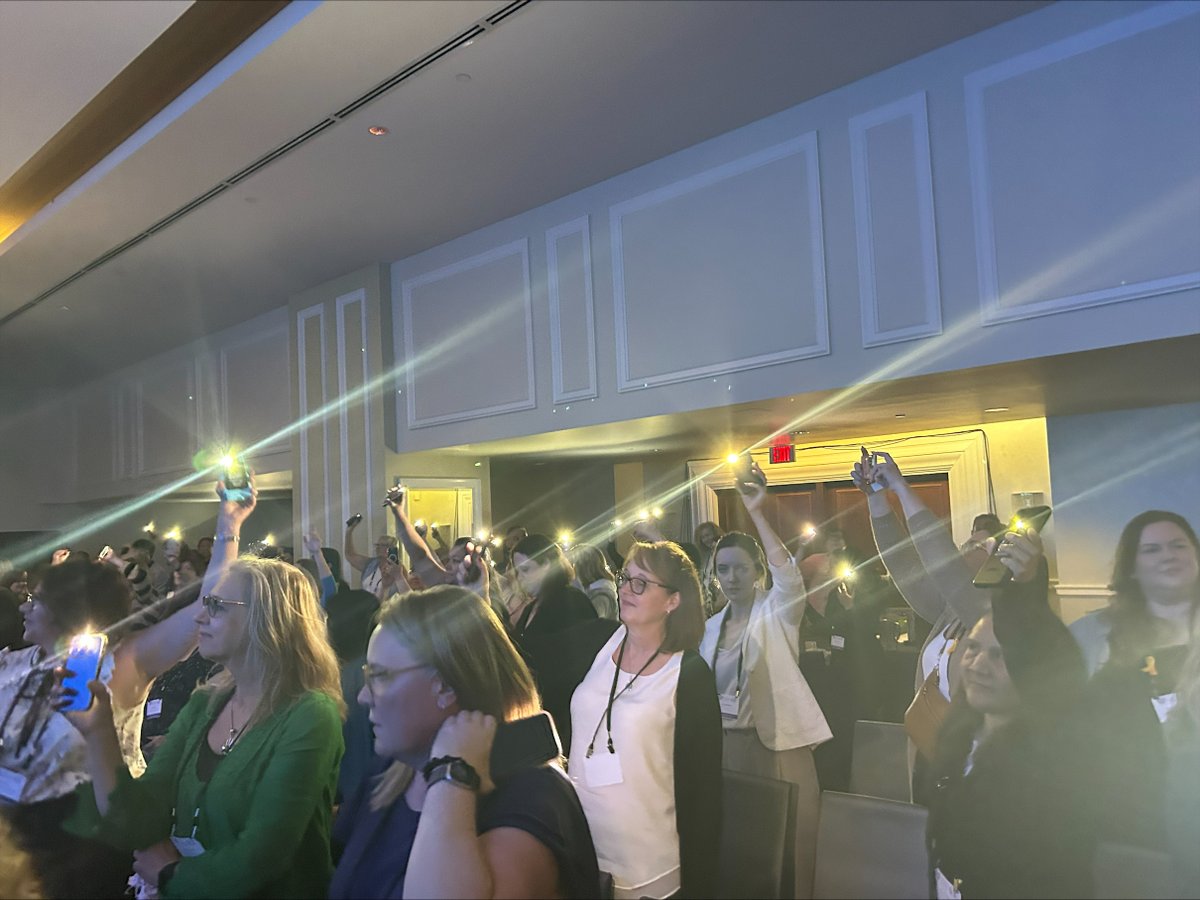 'This photo with phone flashlights was a really beautiful moment. The keynote ended with 'Each of you is a lighthouse.'' -Beth, our #LivingWorks lead in Canada shares one of her #InspiringHopeTogether moments from the @CASP_CA National #SuicidePrevention Conference this week 🧡