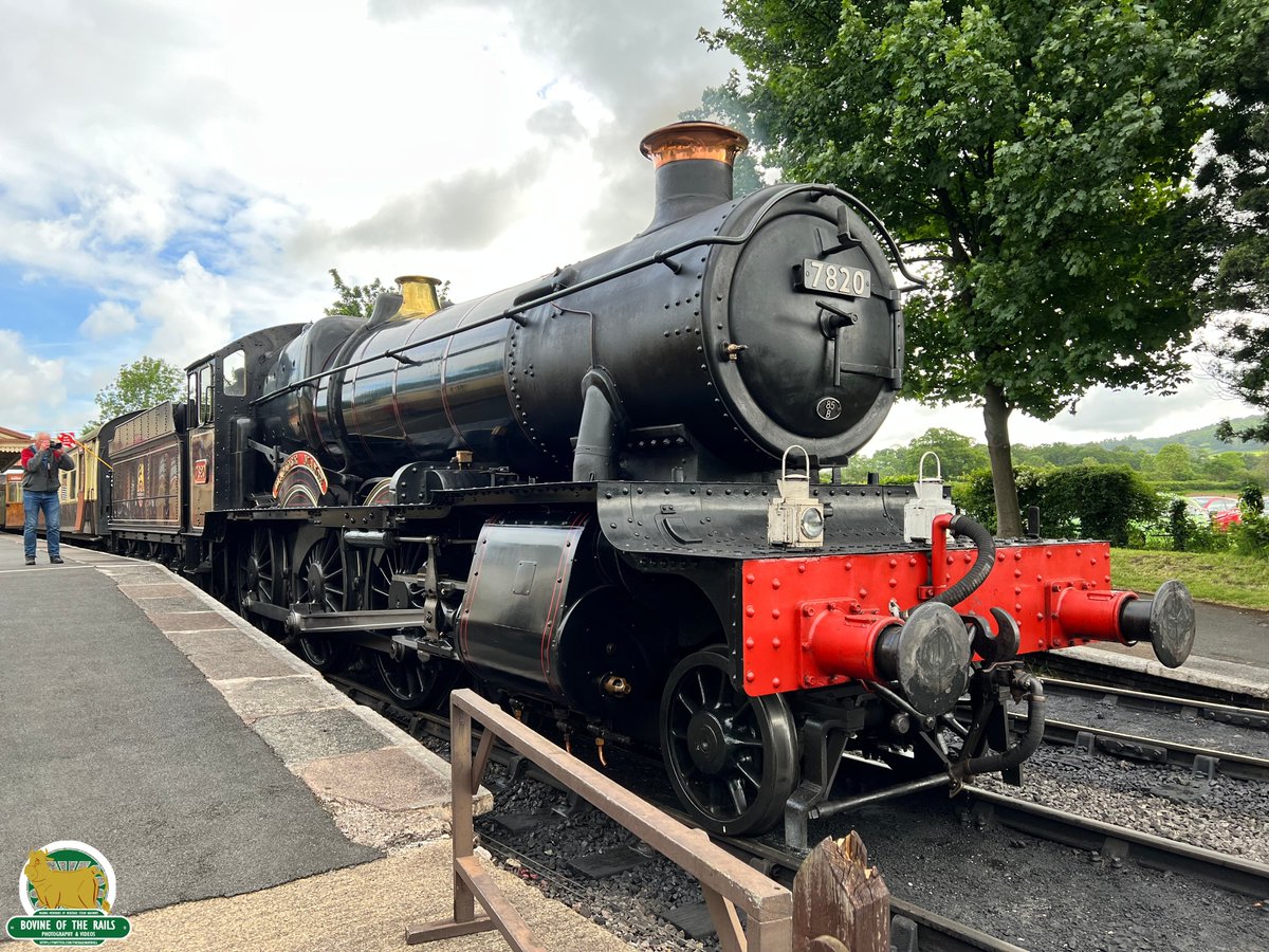'Dinmore Manor' simmers in the station at Toddington as passengers board the service bound for Cheltenham. #CotswoldFestivalOfSteam #GWSR #WesternWorkhorses #Steam 27th May 2024.