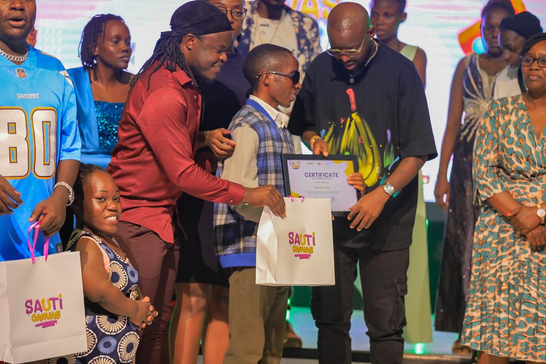 Makerere University Business School (@officialmubs) on Twitter photo Two of our Students, Shamim Wakobera and Julius Kwizera (both PWDs from MUBS) have been recognized for their great performances at the Sauti Canvas competition. Congratulations 🎊
<a href="/MUBSDRL_Centre/">MUBS Disability Resource and Learning Centre</a>
<a href="/ByomireGorretti/">BYOMIRE GORRETTI</a>
<a href="/eddykenzoficial/">Eddy Kenzo</a> Two of our Students, Shamim Wakobera and Julius Kwizera (both PWDs from MUBS) have been recognized for their great performances at the Sauti Canvas competition. Congratulations 🎊
<a href="/MUBSDRL_Centre/">MUBS Disability Resource and Learning Centre</a>
<a href="/ByomireGorretti/">BYOMIRE GORRETTI</a>
<a href="/eddykenzoficial/">Eddy Kenzo</a>