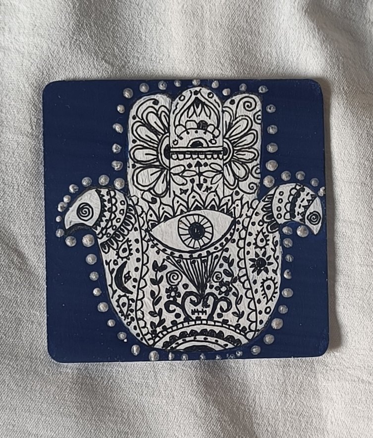 Handpainted and varnished mdf wood fridge magnet. The Hamsa, also known as the hand of Fatima. A universal sign of protection, power and strength. DM to purchase. Size: 3 in X 3 in X 3mm. Share to amplify. #ArtbyTee #artforhome #artforsale #hamsahand #goodvibes #giftidea