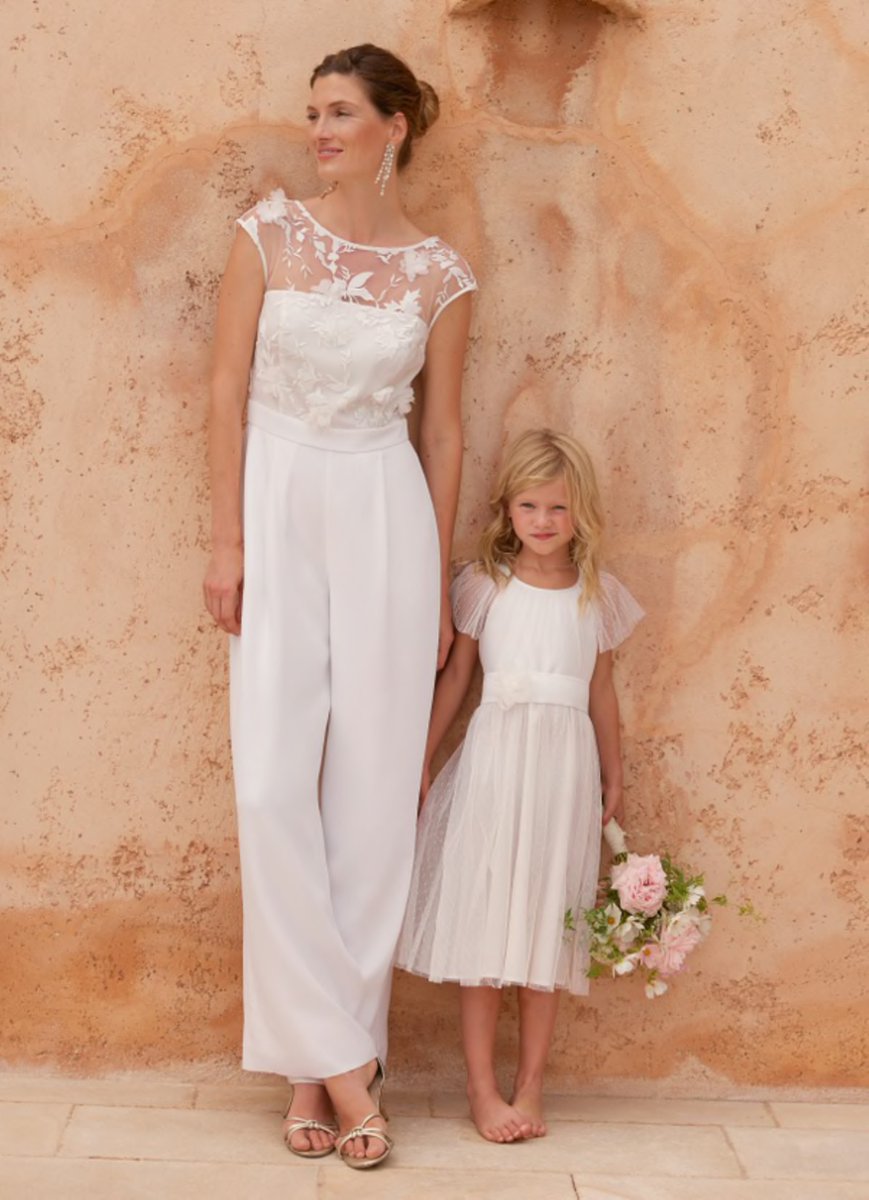 An elegant jumpsuit, perfect for the bride-to-be. @Phase_Eight's Cherie jumpsuit is framed by semi-sheer long sleeves and features an embellished waistband and pleated wide-leg trousers. Discover the beautiful bridal collection today > bit.ly/44Z7IAJ
