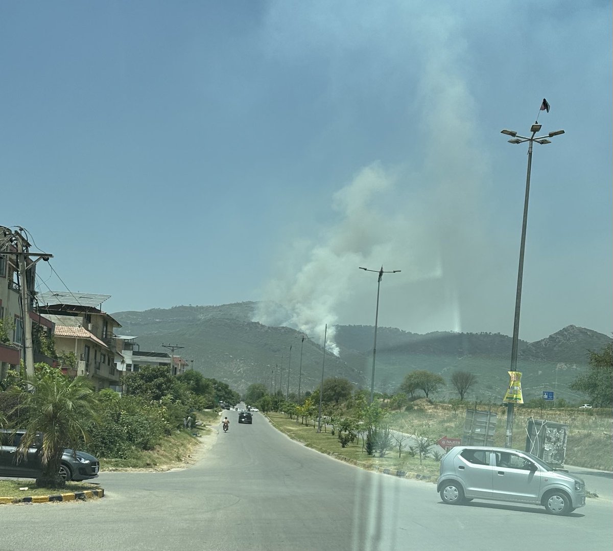 Margalla hills near Islamabad again on fire. Some people are intentionally using fire to steal wood.