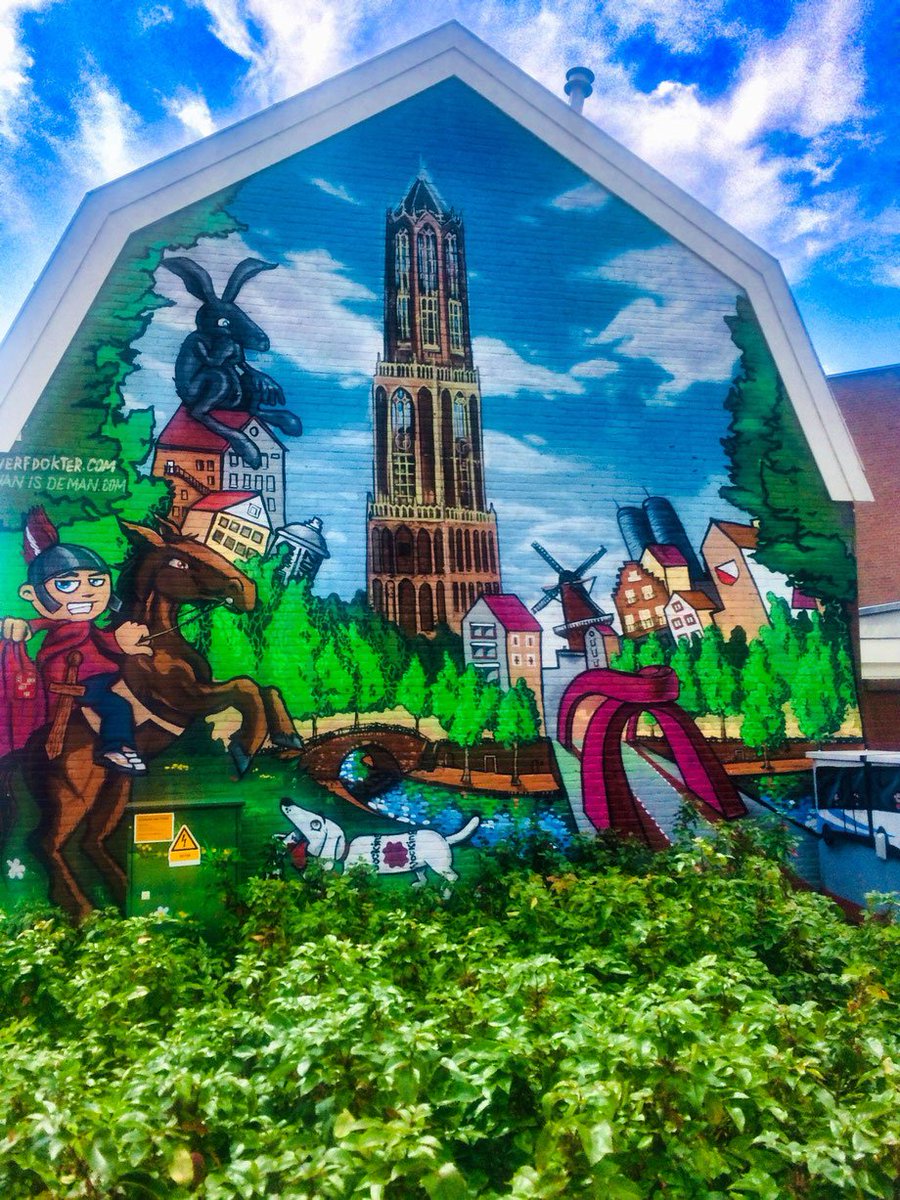 BvZantwijk's tweet photo. #Utrecht. Muurschildering van Jan Heinsbroek #JanIsDeMan en Robert-Jan Brink #DeVerfdokter op de #Loevenhoutsedijk vol met #Utrechtse elementen, zoals de #Domtoren, #Oudegracht, #SintMaarten, #DeRodeBrug, molen #RijnEnZon, Rabotoren #Verrekijker, #ThinkerOnARock en #Vockingworst https://t.co/sZRbxoJE3t