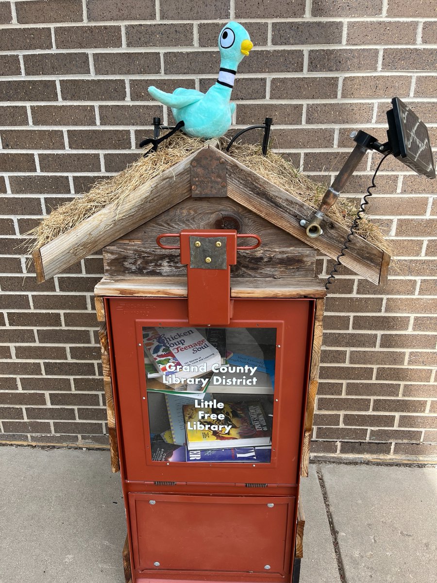 codepted's tweet photo. .@The_Pigeon was at home at Grand County Library's Granby Branch. The Pigeon was really excited about the branch's Library of Things and even borrowed a pickleball set and @COParksWildlife's Check Out Colorado State Parks backpack (both of which are now overdue). https://t.co/WvlEWFK1AA