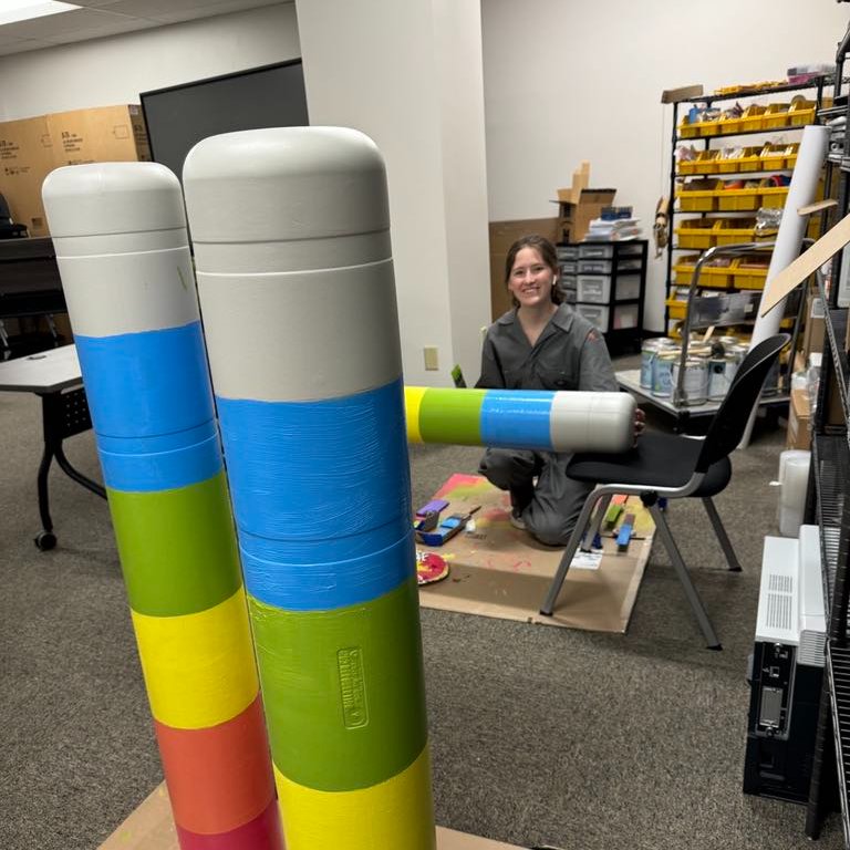 TroyMiamiCtyPL's tweet image. 🎨Our artistic Teen Intern Lily, with an installation assist from Ava, has struck again designing and painting post covers using our logo colors and leftover paint from the #MakerLab mural to brighten up the back entrance at #TMCPL.