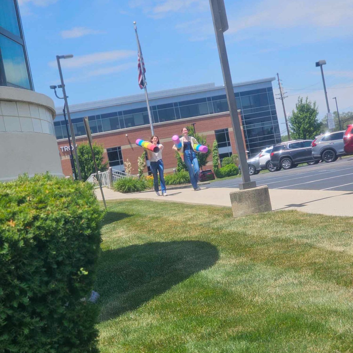 TroyMiamiCtyPL's tweet image. 🎨Our artistic Teen Intern Lily, with an installation assist from Ava, has struck again designing and painting post covers using our logo colors and leftover paint from the #MakerLab mural to brighten up the back entrance at #TMCPL.