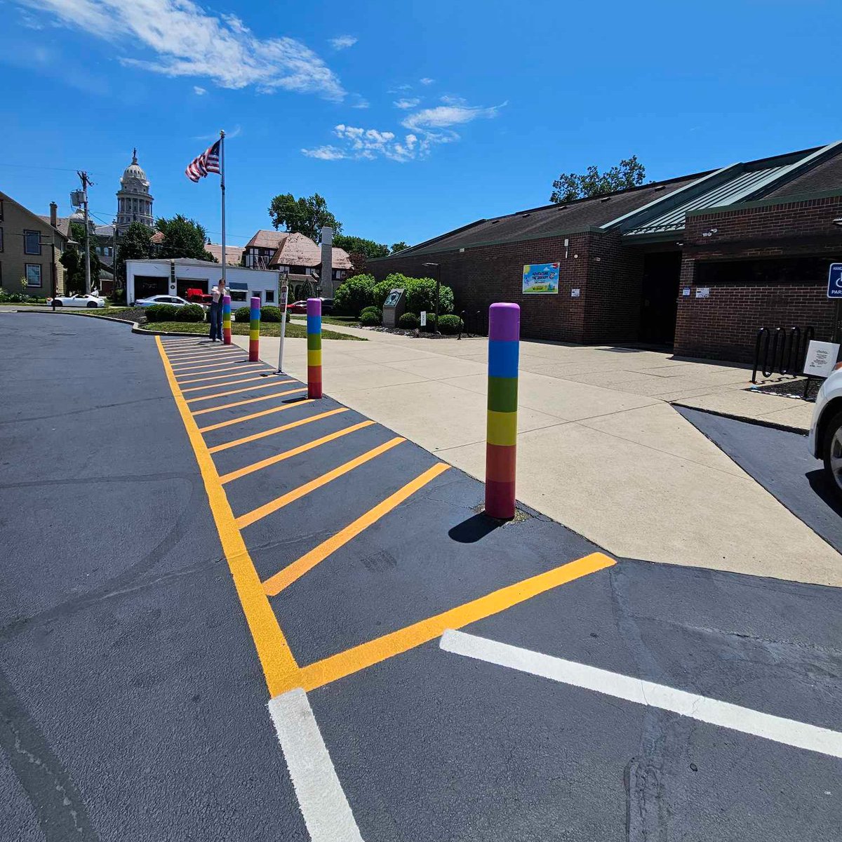 TroyMiamiCtyPL's tweet image. 🎨Our artistic Teen Intern Lily, with an installation assist from Ava, has struck again designing and painting post covers using our logo colors and leftover paint from the #MakerLab mural to brighten up the back entrance at #TMCPL.