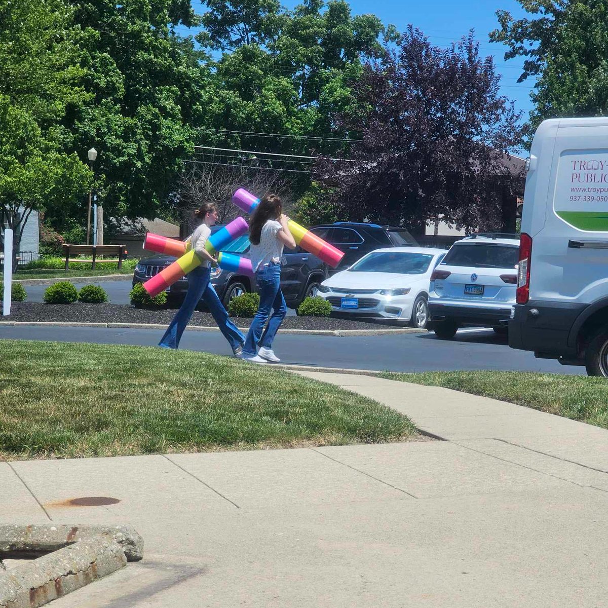 TroyMiamiCtyPL's tweet image. 🎨Our artistic Teen Intern Lily, with an installation assist from Ava, has struck again designing and painting post covers using our logo colors and leftover paint from the #MakerLab mural to brighten up the back entrance at #TMCPL.
