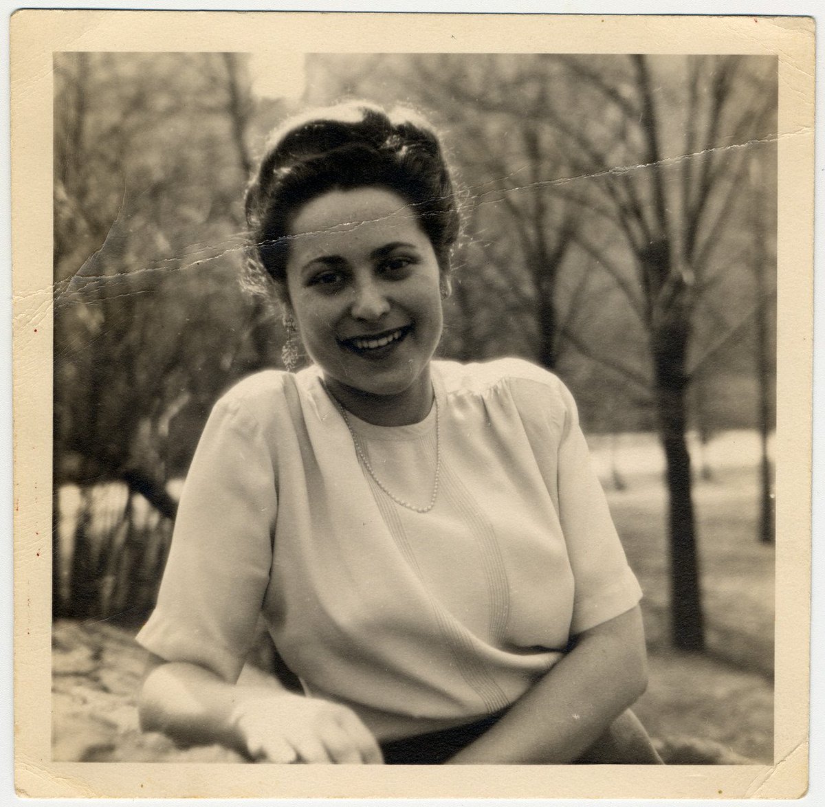 HolocaustMuseum's tweet photo. As the Germans marched on Paris, Margit Meissner, 18, fled carrying underwear, chocolate croissants, and notes and pens from her dressmaking studies. Her design skills later helped her start a new life in America. #NationalSewingMachineDay https://t.co/mDaFpWZGRb