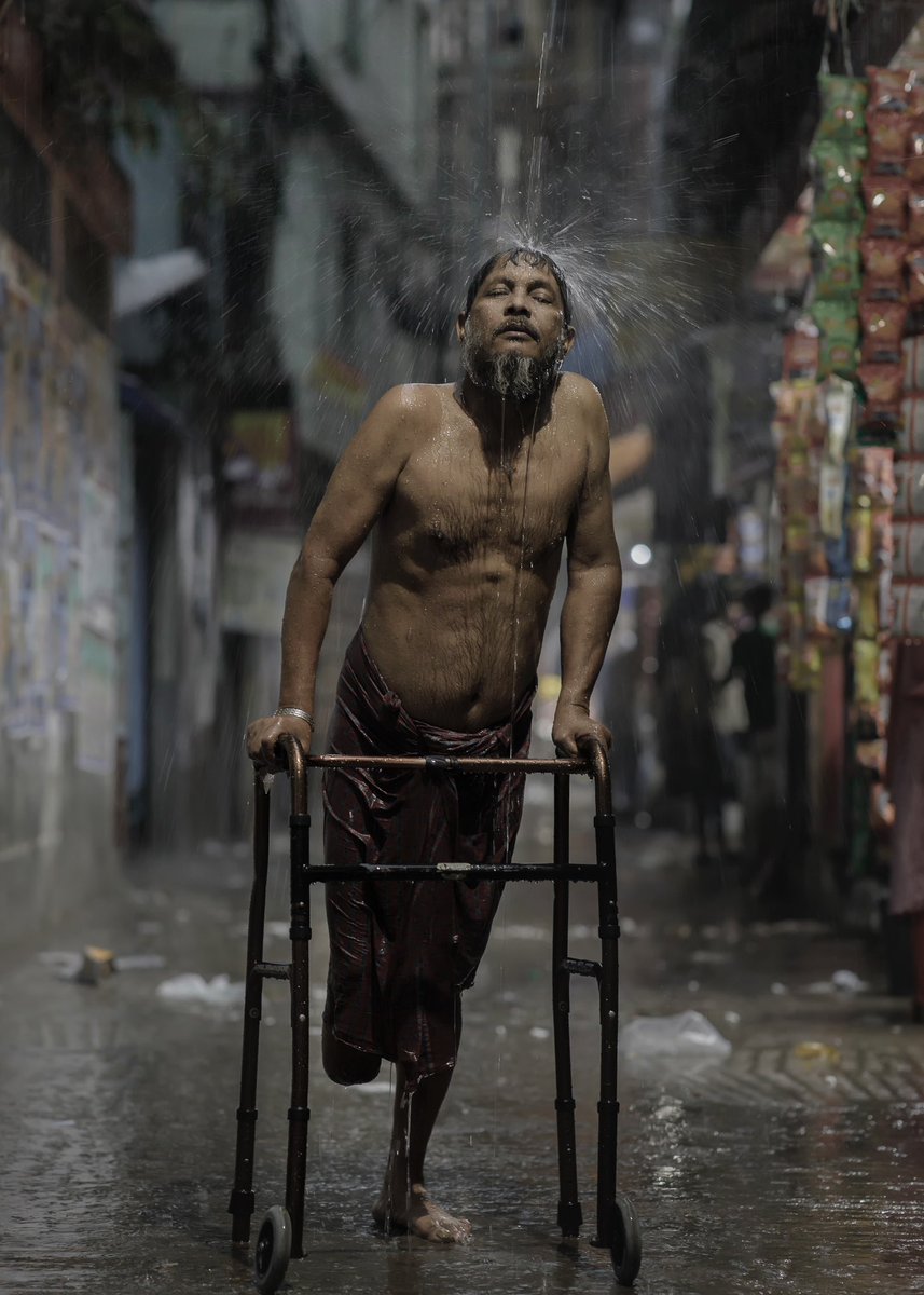 Salim Bhai is taking a shower in the pouring rain today after several hot days in Dhaka. He used to work before, where he lost one of his legs on duty. Everyday life is pretty tough for him.

#rain #dhaka #bangladesh #heatwave #rainyday #life #street #instagram #citylife