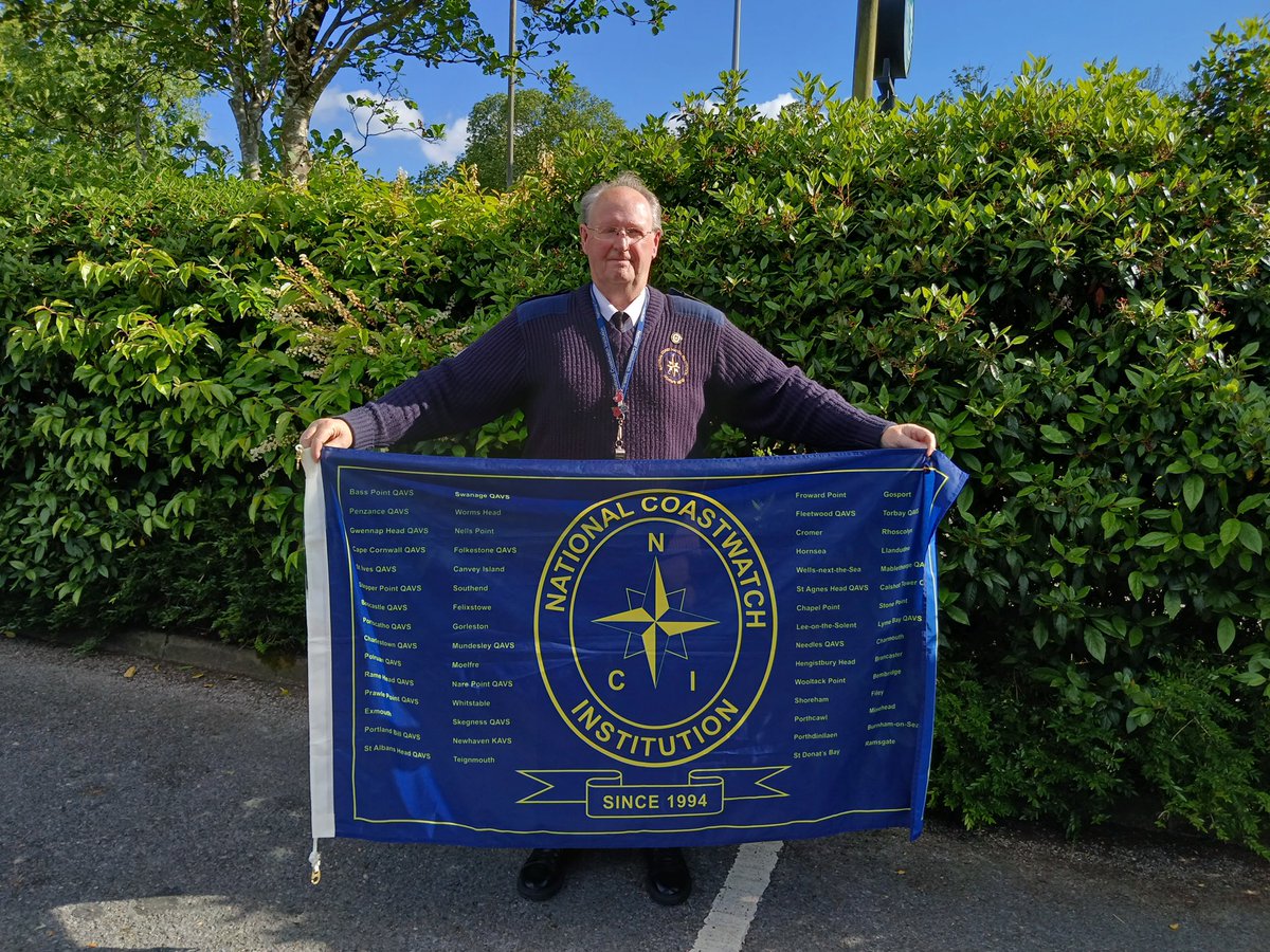 WormsHead_NCI's tweet photo. The 30th Anniversary celebratory Flag arrived at Worm’s Head with help from Station Manager Andy, DSM Jo along with Watch-keepers Ernie &amp; Janet. 
Thanks also to the unsung and ‘unphotographed’ help from JWW, ex WK Roy and Mrs Station Manager, Julie.
#onto @PorthcawlNCI https://t.co/9v8ESxjmI5